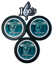 Three cans of Jake's Mint Chew Wintergreen Pouches arranged below the Jake's Mint Chew logo, promoting a tobacco-free and nicotine-free wintergreen-flavored alternative